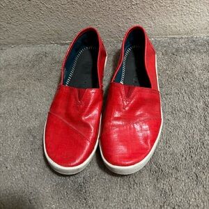 TOMS shiny red canvas shoes